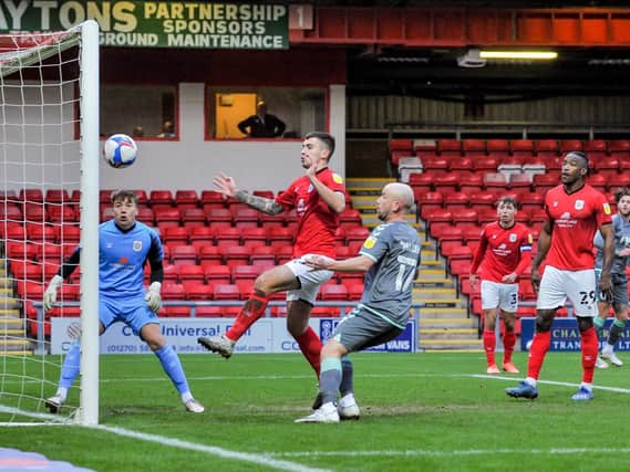 Wes Burns' (far right) effort rebounds off the woodwork at Crewe