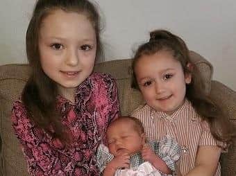 Little Willow-Rose Edington-Whiteley with older sisters Daisy-Mae (nine) and Hollie Louise (five)