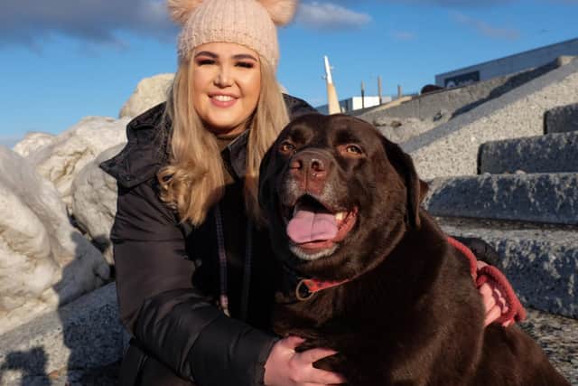 Vicki Smith-Payne pictured with pet Labrador Bruno, who got trapped under a rock on Cleveleys promenade on New Year's Eve.