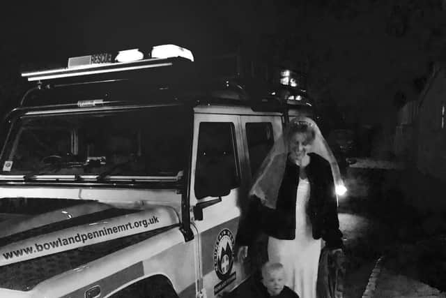 Harriet and daughter Beatrix travelled to the ceremony under the blues and twos of the Bowland Pennine Mountain Rescue Land Rover