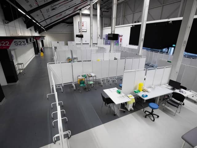 Vaccination booths are seen inside Ashton Gate Stadium in Bristol