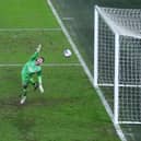 Emergency loan keeper Joe Hilton can't keep out Lewie Coyle's long-range winner for Hull