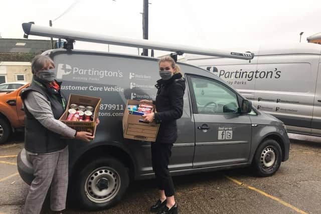 Partington’s purchasing manager Sharon Tomkinson and marketing assistant Acacia Cairns delivering much needed donations to Blackpool Food Bank and Streetlife