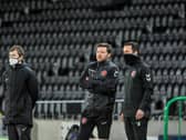 Simon Wiles (centre) has the full backing of Fleetwood chairman Andy Pilley in his interim role