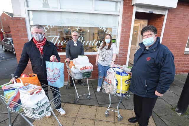 Rick Gilby from Thornton dropped off trolleys full of donated food at the Pantry in Fleetwood, run by Faith in the Community. He is pictured (left) with volunteers Mike Winrow, Julie Simkiss and Father John Hall. Photo: Daniel Martino for JPI Media