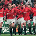 United celebrate Eric Cantona's late FA Cup final winner in 1996