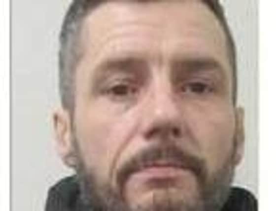 Police say John Elliot, 41, has links to Lancashire and might be hiding out in the county