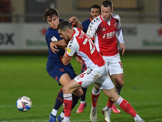 Sam Stubbs in action during his last Fleetwood Town match against Blackpool in the Papa John's Trophy