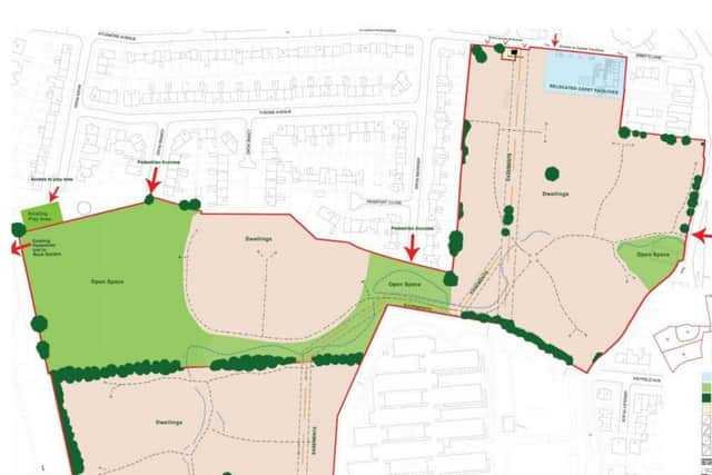 A plan of the proposed development with beige areas showing housing and green depicting green space.