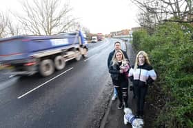 Residents close to Bourne Road in Thornton want traffic calming measures and better footpaths and lighting installed due to speeding cars and trucks. Pictured are Lindsay Gemmell and Robert Goodwin with Millie Gemmell at the spot where they were nearly hit by a car.