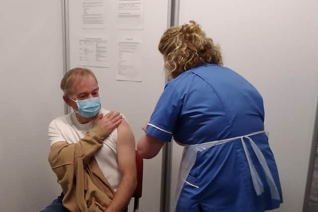 Jon Armstrong receives his vaccine