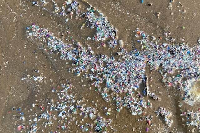 Microplastics on Rossall beach. Environment campaign group LOVEmyBEACH have been made aware of the pollution appearing on shores across the Fylde coast, which can severely harm marine wildlife. Photo: Christine Taylor