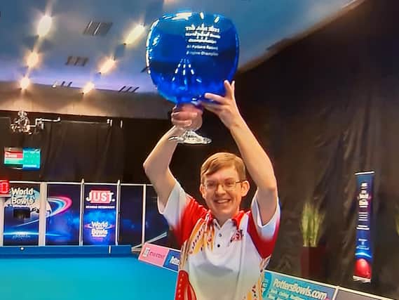 Mark Dawes with the open singles trophy, his second title at this year's World Indoor Bowls Championships