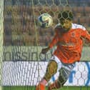 Ellis Simms scored two of Blackpool's five goals on his first league appearance