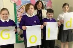 Pupils at Boundary School celebrate the Gold Mark award