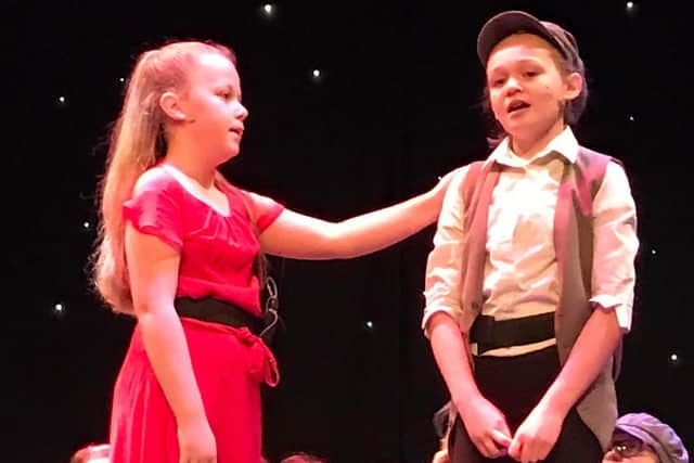 Two of the Boundary Primary School youngsters performing on stage