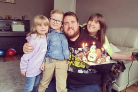 Adam Fishwick, 30, is battling Covid-19 on a ventilator in ICU at Blackpool Vic. He is pictured with partner Hayley, daughter Olivia, four, and son Owen, six. Photo: Hayley Sharples