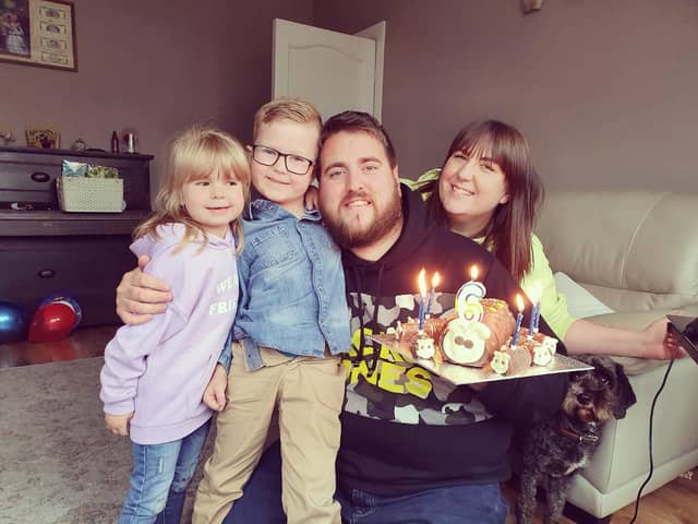 Adam Fishwick, 30, is battling Covid-19 on a ventilator in ICU at Blackpool Vic. He is pictured with partner Hayley, daughter Olivia, four, and son Owen, six. Photo: Hayley Sharples