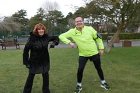 Kelvin Wood is congratulated at the end of his final run to Lytham's Lowther Gardens by Bobby Ball's widow Yvonne