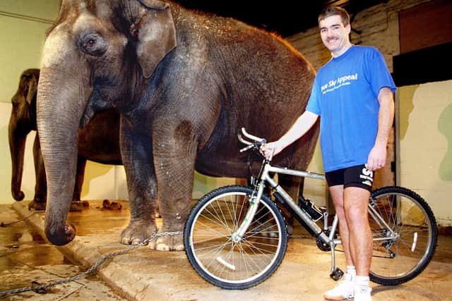 Charity cyclist PC Andy Duncan made a call to sponsors - with a little help from Crumples the Asian elephant ahead of his cycle ride in India