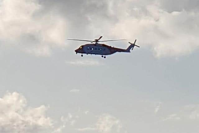 In addition to the rescue teams searching the coastline, HM Coastguard alerted its operations centre at Holyhead who diverted one of its helicopters from a training exercise to join the search