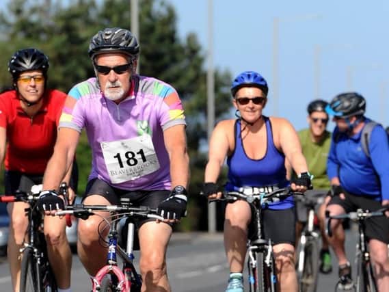People take part in the Beaverbrooks bike ride in 2019