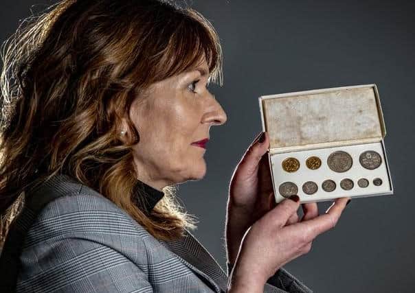 Jo Fletcher-Lee, commercial director at Tennants Auctioneers in Leyburn with a George V, 1911 Coronation 10-coin set