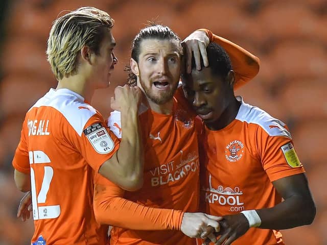 James Husband, centre, and Sullay Kaikai, right, were in fine form for the Seasiders last night
