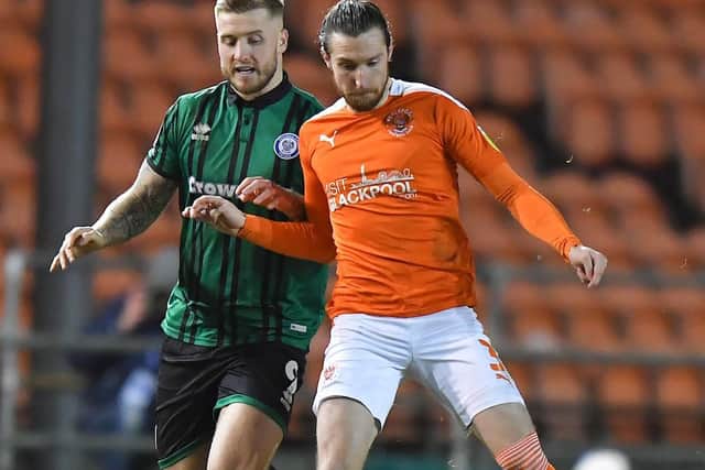 Husband sported a new top-knot hairstyle during last night's win against Rochdale