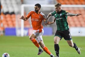 Kevin Stewart battles for possession during Blackpool's 1-0 win