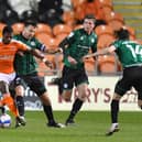 Matchwinner Sullay Kaikai takes on the Rochdale defence during Blackpool's hard-earned victory at Bloomfield Road