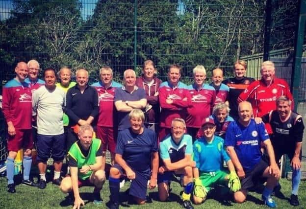 Degree student Brad Bayliss (back, second right) with the BFCCT walking football group