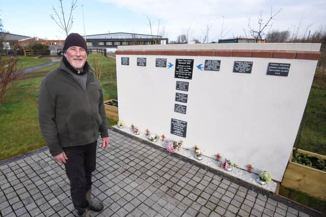 John Jones, a volunteer at the Fylde Memorial Arboretum, installed a plaque for Capt Sir Tom Moore to pay tribute to his military service and NHS fundraising. Picture: Daniel Martino/JPI Media