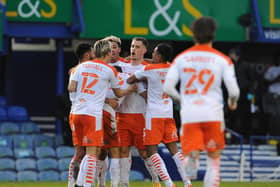 Jerry Yates celebrates his late winner for Blackpool against Portsmouth