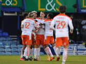 Jerry Yates celebrates his late winner for Blackpool against Portsmouth