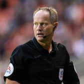 Referee Robert Lewis