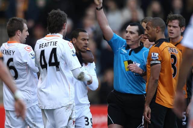 DJ Campbell is sent off in Blackpool's defeat at Wolves