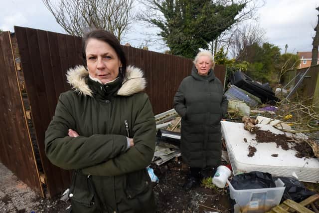 Anne-Marie Anderton with Coun Andrea Kay who says although the road and alleyway is private land and recently sold at auction, the council should be able to help clear it up.