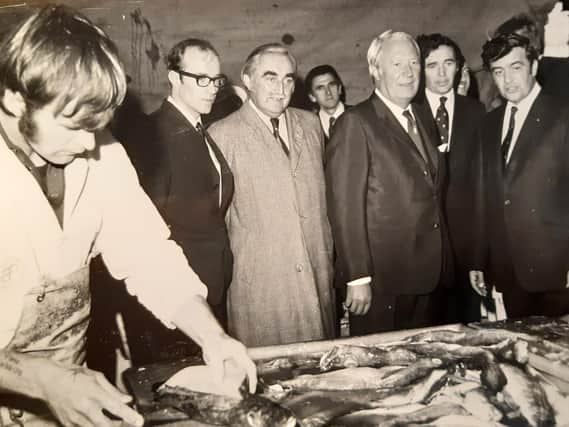 An early 1970s photo when Edward Heath visited Fleetwood. Also pictured is Sir Walter Clegg, who was the port's MP and Robert Hall, filleting
