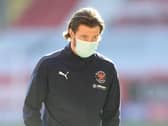 James Husband suffered a calf injury during the warm-up at The Valley yesterday