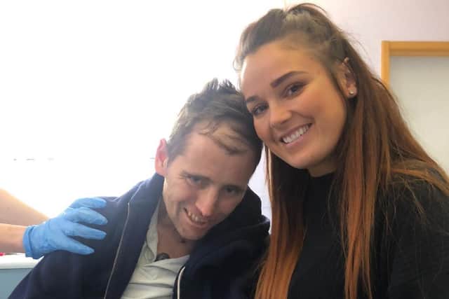 Dave with wife Keeley during his recovery