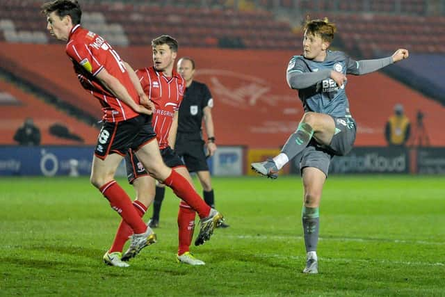 Ged Garner fires Fleetwood ahead with his first league goal at Lincoln