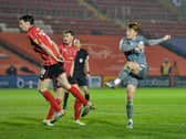 Ged Garner fires Fleetwood ahead with his first league goal at Lincoln