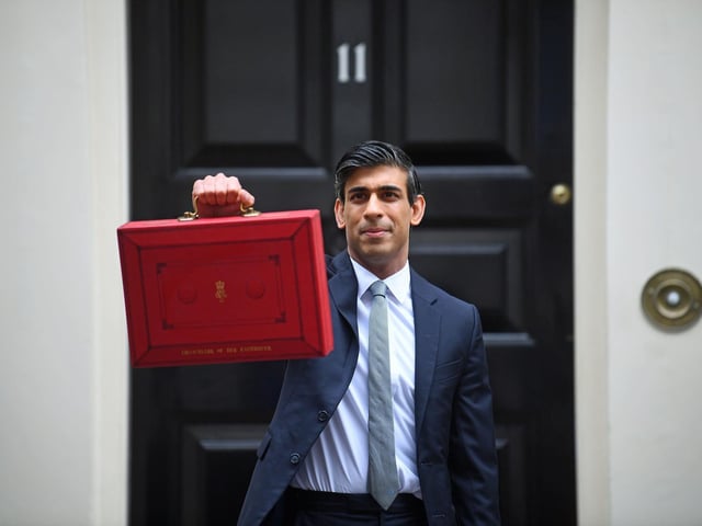 Chancellor Rishi Sunak with the traditional Budget red box outside Number 11 Downing Street