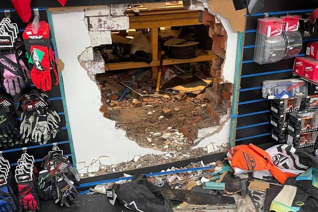 The thieves forced their way into the shop by smashing a huge hole in the brick wall at 3.30am (Wednesday, March 3)