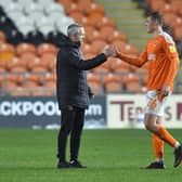 Blackpool boss Neil Critchley congratulates Dan Ballard
