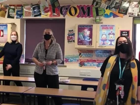 Staff at Montgomery Academy welcomed back their pupils 'for good' with a remake of classic 90s boy band single Back for Good, by Take That. Pic: FCAT Youtube