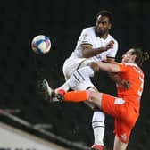 James Husband competes with Cameron Jerome at Stadium:MK