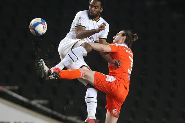 James Husband competes with Cameron Jerome at Stadium:MK