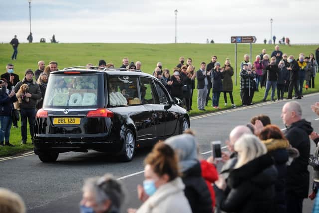 Applause for Bobby as his funeral cortege passes Lowther Gardens and Pavilion in Lytham
